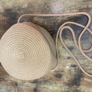 Round woven crossbody bag